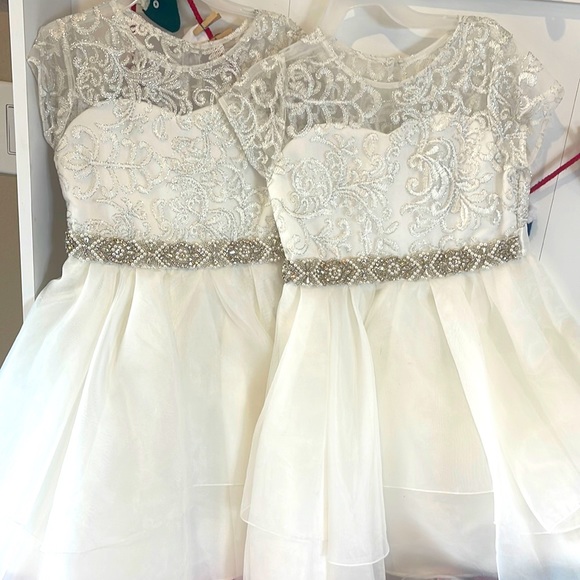 These dresses are light cream color not white but not ivory. Both for $32 - Picture 1 of 5